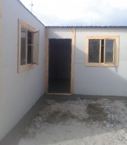 Custom wooden Wendy house in a garden setting